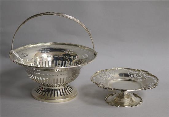 An Edwardian pierced silver fruit basket, Birmingham, 1907 and a small silver pedestal dish. 14.5 oz.